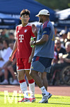 30.07.2026, Fussball Bundesliga 2026/2027, Trainingslager FC Bayern München in Rottach-Egern am Tegernsee (Bayern). Testspiel FC Rottach Egern - FC Bayern München,    v.l. Min-jae Kim (Bayern München, Minjae Kim) und Trainer Vincent Kompany (FC Bayern München) im Gespräch 