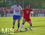 30.07.2026, Fussball Bundesliga 2026/2027, Trainingslager FC Bayern München in Rottach-Egern am Tegernsee (Bayern). Testspiel FC Rottach Egern - FC Bayern München,     v.l. Fetlullah  Sourtsoglou (FC Rottach-Egern) gegen Felipe Chavez (FC Bayern München).