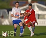 30.07.2026, Fussball Bundesliga 2026/2027, Trainingslager FC Bayern München in Rottach-Egern am Tegernsee (Bayern). Testspiel FC Rottach Egern - FC Bayern München,    Aleksandar Pavlovic (re, FC Bayern München)  setzt sich durch. 