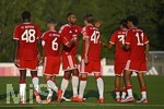 30.07.2026, Fussball Bundesliga 2026/2027, Trainingslager FC Bayern München in Rottach-Egern am Tegernsee (Bayern). Testspiel FC Rottach Egern - FC Bayern München,     v.l. Bastian Assomo (FC Bayern München), Joshua Kimmich (FC Bayern München), Jonathan Tah (FC Bayern München), Guido Della Rovere (Bayern München) , Nuraj Skender (FC Bayern München) und Nathaniel Brown (FC Bayern München) jubeln.