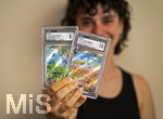 05.08.2026, Deutschland, Bayern, Pokemon-Sammelkarten, eine Teenagerin (Viola) sammelt begeistert Pokemon-Karten. (Modelreleased)   