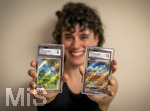 05.08.2026, Deutschland, Bayern, Pokemon-Sammelkarten, eine Teenagerin (Viola) sammelt begeistert Pokemon-Karten. (Modelreleased)  