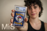 05.08.2026, Deutschland, Bayern, Pokemon-Sammelkarten, eine Teenagerin (Viola) sammelt begeistert Pokemon-Karten. (Modelreleased)   