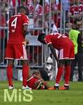 15.08.2026, Fussball Bundesliga 2026/2027, Testspiel Telecom-Cup, FC Bayern München - RB Leipzig, in der Allianz-Arena München, Sacha Boey (FC Bayern München) am Boden.