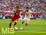 15.08.2026, Fussball Bundesliga 2026/2027, Testspiel Telecom-Cup, FC Bayern München - RB Leipzig, in der Allianz-Arena München, v.li: Tim Binder (Bayern München) gegen Max Finkgräfe (RB Leipzig) 