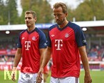 18.08.2026, Fussball Bundesliga 2026/2027, Testspiel, 1.FC Heidenheim - FC Bayern München, in der Voith-Arena Heidenheim, v.l. Josip Stanisic (Bayern München) und Harry Kane (FC Bayern München) 