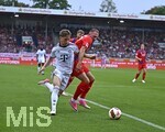 18.08.2026, Fussball Bundesliga 2026/2027, Testspiel, 1.FC Heidenheim - FC Bayern München, in der Voith-Arena Heidenheim, v.l.  Tim Binder (Bayern München) gegen Jonas Föhrenbach (1. FC Heidenheim 1846) 