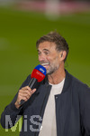 28.08.2026, Fussball Bundesliga 2026/2027, 1.Spieltag, FC Bayern München - VfB Stuttgart, in der Allianz-Arena München, Bundestrainer Jürgen Klopp (Deutschland) am SKY-Sport Mikrofon vor dem Spiel.