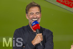 28.08.2026, Fussball Bundesliga 2026/2027, 1.Spieltag, FC Bayern München - VfB Stuttgart, in der Allianz-Arena München, Bundestrainer Jürgen Klopp (Deutschland) am SKY-Sport Mikrofon vor dem Spiel.