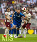 30.08.2026, Fussball Bundesliga 2026/2027, 1.Spieltag, FC Augsburg - FC Schalke 04, in der WWK-Arena Augsburg, v.li: Fabian Rieder (FC Augsburg), Edin Dzeko (Schalke 04), Calvin Brackelmann (FC Augsburg) 