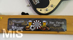 10.09.2026, Dart-Vereinsheim im Allgäu, Schild: Wellness für Männer: Bier, Fleisch, Sport.