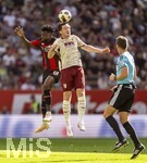 12.09.2026, Fussball Bundesliga 2026/2027, 3.Spieltag, FC Augsburg - Bayer Leverkusen, in der WWK-Arena Augsburg, v.li: Edmond Tapsoba (Leverkusen) gegen Michael Gregoritsch (FC Augsburg) 


