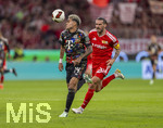 18.09.2026, Fussball Bundesliga 2026/2027, 4.Spieltag, FC Bayern München - 1.FC Union Berlin, in der Allianz-Arena München, Luis Diaz (li, FC Bayern München) am Ball gegen Emmanuel Latte Lath (Union Berlin) 