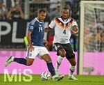 27.09.2026, Fussball UEFA Nations-League 2026/2027, 2.Spieltag, Deutschland - Griechenland, in der WWK-Arena Augsburg, v.l. Vangelis Pavlidis (Griechenland) gegen Jonathan Tah (Deutschland) 