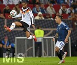 27.09.2026, Fussball UEFA Nations-League 2026/2027, 2.Spieltag, Deutschland - Griechenland, in der WWK-Arena Augsburg, Kevin Schade (Deutschland) am Ball. Kostas Tsimikas (Griechenland) 