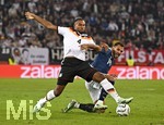 27.09.2026, Fussball UEFA Nations-League 2026/2027, 2.Spieltag, Deutschland - Griechenland, in der WWK-Arena Augsburg, v.l. Jonathan Tah (Deutschland) gegen Vangelis Pavlidis (Griechenland) 
