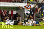 27.09.2026, Fussball UEFA Nations-League 2026/2027, 2.Spieltag, Deutschland - Griechenland, in der WWK-Arena Augsburg, Bambase Conte (re, Deutschland), Josha Vagnoman (Deutschland) am Boden 