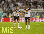 27.09.2026, Fussball UEFA Nations-League 2026/2027, 2.Spieltag, Deutschland - Griechenland, in der WWK-Arena Augsburg, v.li: Joshua Kimmich (Deutschland), Nathaniel Brown (Deutschland) nachdenklich 