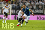 27.09.2026, Fussball UEFA Nations-League 2026/2027, 2.Spieltag, Deutschland - Griechenland, in der WWK-Arena Augsburg, v.li: Joshua Kimmich (Deutschland) gegen Vangelis Pavlidis (Griechenland) b