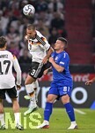 01.10.2026, Fussball UEFA Nations-League 2026/2027, 3.Spieltag, Deutschland - Serbien, in der Allianz-Arena München. v.l Waldemar Anton (Deutschland) gegen Luka Jovic (Serbien) 