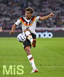 01.10.2026, Fussball UEFA Nations-League 2026/2027, 3.Spieltag, Deutschland - Serbien, in der Allianz-Arena München. Tom Bischof (Deutschland) am Ball.
