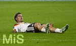 01.10.2026, Fussball UEFA Nations-League 2026/2027, 3.Spieltag, Deutschland - Serbien, in der Allianz-Arena München. Florian Wirtz (Deutschland) am Boden.