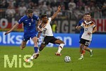 01.10.2026, Fussball UEFA Nations-League 2026/2027, 3.Spieltag, Deutschland - Serbien, in der Allianz-Arena München. v.l. Strahinja Pavlovic (Serbien) gegen Bambase Conte  (Deutschland) 