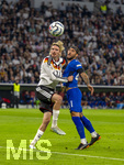 01.10.2026, Fussball UEFA Nations-League 2026/2027, 3.Spieltag, Deutschland - Serbien, in der Allianz-Arena München. von links:  Nick Woltemade (Deutschland) gegen Nemanja Gudelj (Serbien) 
