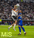 01.10.2026, Fussball UEFA Nations-League 2026/2027, 3.Spieltag, Deutschland - Serbien, in der Allianz-Arena München. von links:  Nick Woltemade (Deutschland) gegen Nemanja Gudelj (Serbien) 
