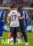 01.10.2026, Fussball UEFA Nations-League 2026/2027, 3.Spieltag, Deutschland - Serbien, in der Allianz-Arena München. v.li: Bundestrainer Jürgen Klopp (Deutschland) herzt Florian Wirtz (Deutschland) nach dem Spiel 