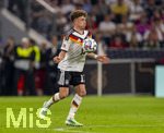 01.10.2026, Fussball UEFA Nations-League 2026/2027, 3.Spieltag, Deutschland - Serbien, in der Allianz-Arena München. Philipp Treu (Deutschland) am Ball 