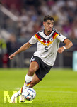 01.10.2026, Fussball UEFA Nations-League 2026/2027, 3.Spieltag, Deutschland - Serbien, in der Allianz-Arena München. Alexander Pavlovic (Deutschland) am Ball 
