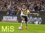 01.10.2026, Fussball UEFA Nations-League 2026/2027, 3.Spieltag, Deutschland - Serbien, in der Allianz-Arena München. Derry Scherhant (Deutschland) am Ball 