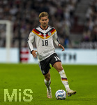 01.10.2026, Fussball UEFA Nations-League 2026/2027, 3.Spieltag, Deutschland - Serbien, in der Allianz-Arena München. Maximilian Mittelstädt (Deutschland) am Ball 