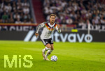 01.10.2026, Fussball UEFA Nations-League 2026/2027, 3.Spieltag, Deutschland - Serbien, in der Allianz-Arena München. Maximilian Mittelstädt (Deutschland) am Ball 