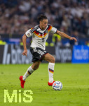 01.10.2026, Fussball UEFA Nations-League 2026/2027, 3.Spieltag, Deutschland - Serbien, in der Allianz-Arena München. Derry Scherhant (Deutschland) am Ball 