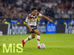 01.10.2026, Fussball UEFA Nations-League 2026/2027, 3.Spieltag, Deutschland - Serbien, in der Allianz-Arena München. Derry Scherhant (Deutschland) am Ball 