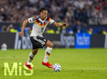 01.10.2026, Fussball UEFA Nations-League 2026/2027, 3.Spieltag, Deutschland - Serbien, in der Allianz-Arena München. Derry Scherhant (Deutschland) am Ball 