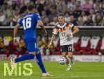 01.10.2026, Fussball UEFA Nations-League 2026/2027, 3.Spieltag, Deutschland - Serbien, in der Allianz-Arena München. Florian Wirtz (Deutschland) am Ball 