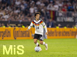 01.10.2026, Fussball UEFA Nations-League 2026/2027, 3.Spieltag, Deutschland - Serbien, in der Allianz-Arena München. Mika Baur (Deutschland) am Ball 