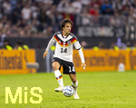 01.10.2026, Fussball UEFA Nations-League 2026/2027, 3.Spieltag, Deutschland - Serbien, in der Allianz-Arena München. Mika Baur (Deutschland) am Ball 