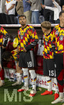 01.10.2026, Fussball UEFA Nations-League 2026/2027, 3.Spieltag, Deutschland - Serbien, in der Allianz-Arena München. Bambase Conte (Deutschland), Lennart Karl (Deutschland) 