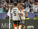 01.10.2026, Fussball UEFA Nations-League 2026/2027, 3.Spieltag, Deutschland - Serbien, in der Allianz-Arena München. Torjubel, Alexander Pavlovic (Deutschland), Tom Bischof (Deutschland), Derry Scherhant (Deutschland) 