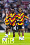 01.10.2026, Fussball UEFA Nations-League 2026/2027, 3.Spieltag, Deutschland - Serbien, in der Allianz-Arena München. Ridle Baku (Deutschland), Bambase Conte (Deutschland)  beim Aufwärmen.