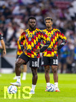 01.10.2026, Fussball UEFA Nations-League 2026/2027, 3.Spieltag, Deutschland - Serbien, in der Allianz-Arena München. Ridle Baku (Deutschland), Bambase Conte (Deutschland)  beim Aufwärmen.
