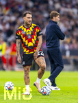 01.10.2026, Fussball UEFA Nations-League 2026/2027, 3.Spieltag, Deutschland - Serbien, in der Allianz-Arena München. David Raum (Deutschland) und Bundestrainer Jürgen Klopp (Deutschland) beim Aufwärmen.
