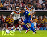 01.10.2026, Fussball UEFA Nations-League 2026/2027, 3.Spieltag, Deutschland - Serbien, in der Allianz-Arena München. v.li: Serge Gnabry (Deutschland), Dusan Tadic (Serbien), Malick Thiaw (Deutschland) 