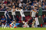 01.10.2026, Fussball UEFA Nations-League 2026/2027, 3.Spieltag, Deutschland - Serbien, in der Allianz-Arena München. Einwechslung als 1000. Nationalspieler, 2.v.li: Mika Baur (Deutschland), li: Derry Scherhant (Deutschland) re: Tom Bischof (Deutschland) 