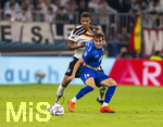 01.10.2026, Fussball UEFA Nations-League 2026/2027, 3.Spieltag, Deutschland - Serbien, in der Allianz-Arena München. Malick Thiaw (Deutschland) gegen Mihajlo Cvetkovic (Serbien) 