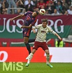 10.10.2026, Fussball Bundesliga 2026/2027, 5.Spieltag, FC Augsburg - FC Bayern München, in der WWK-Arena Augsburg, v.l. Jonathan Tah (FC Bayern München) gegeb Michael Gregoritsch (FC Augsburg) 


